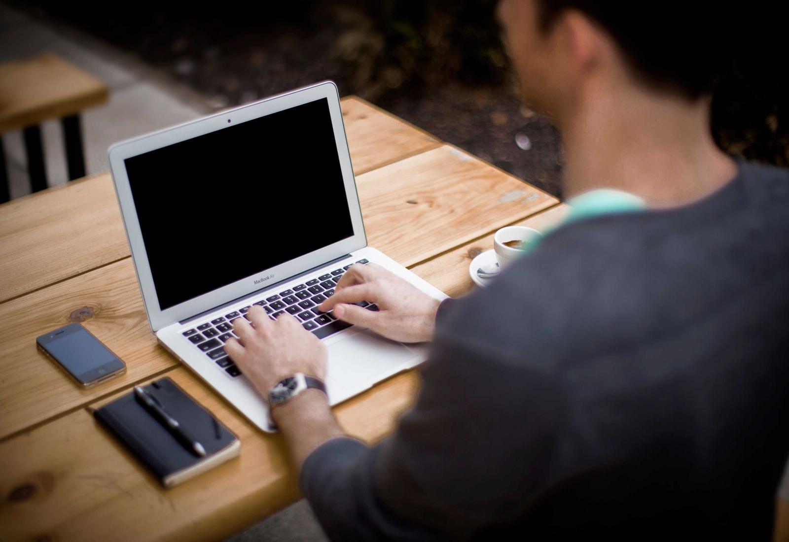 A student working on a laptop